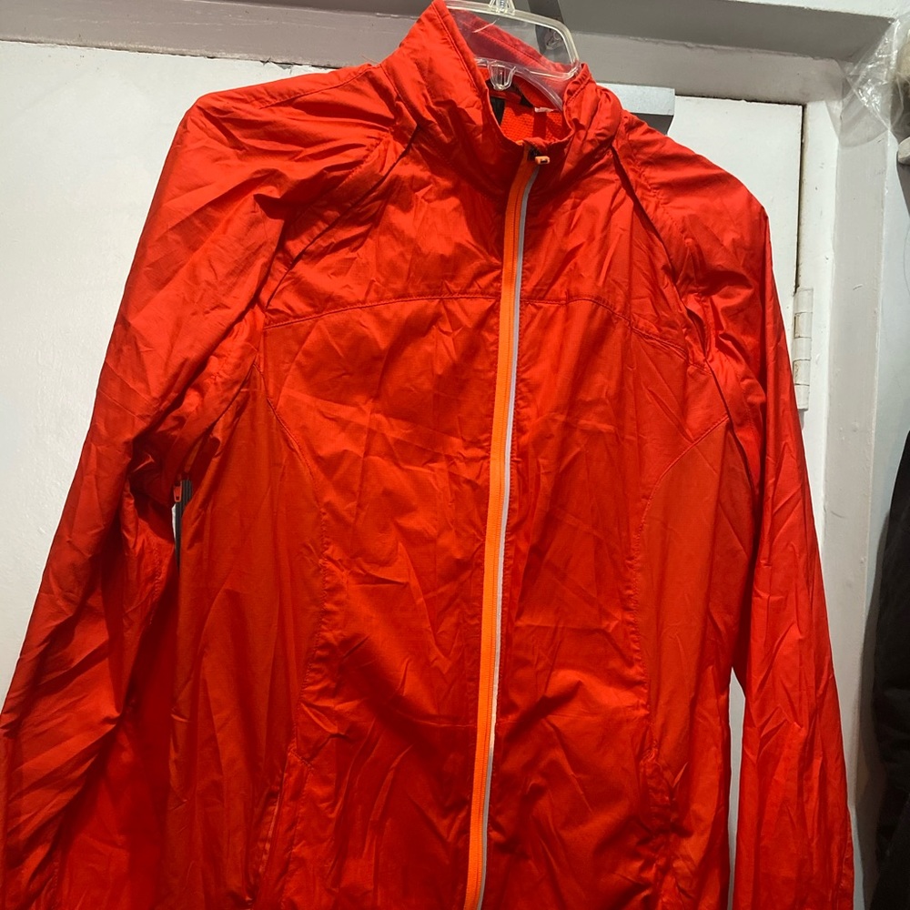 Men’s medium windbreaker with zip off sleeves